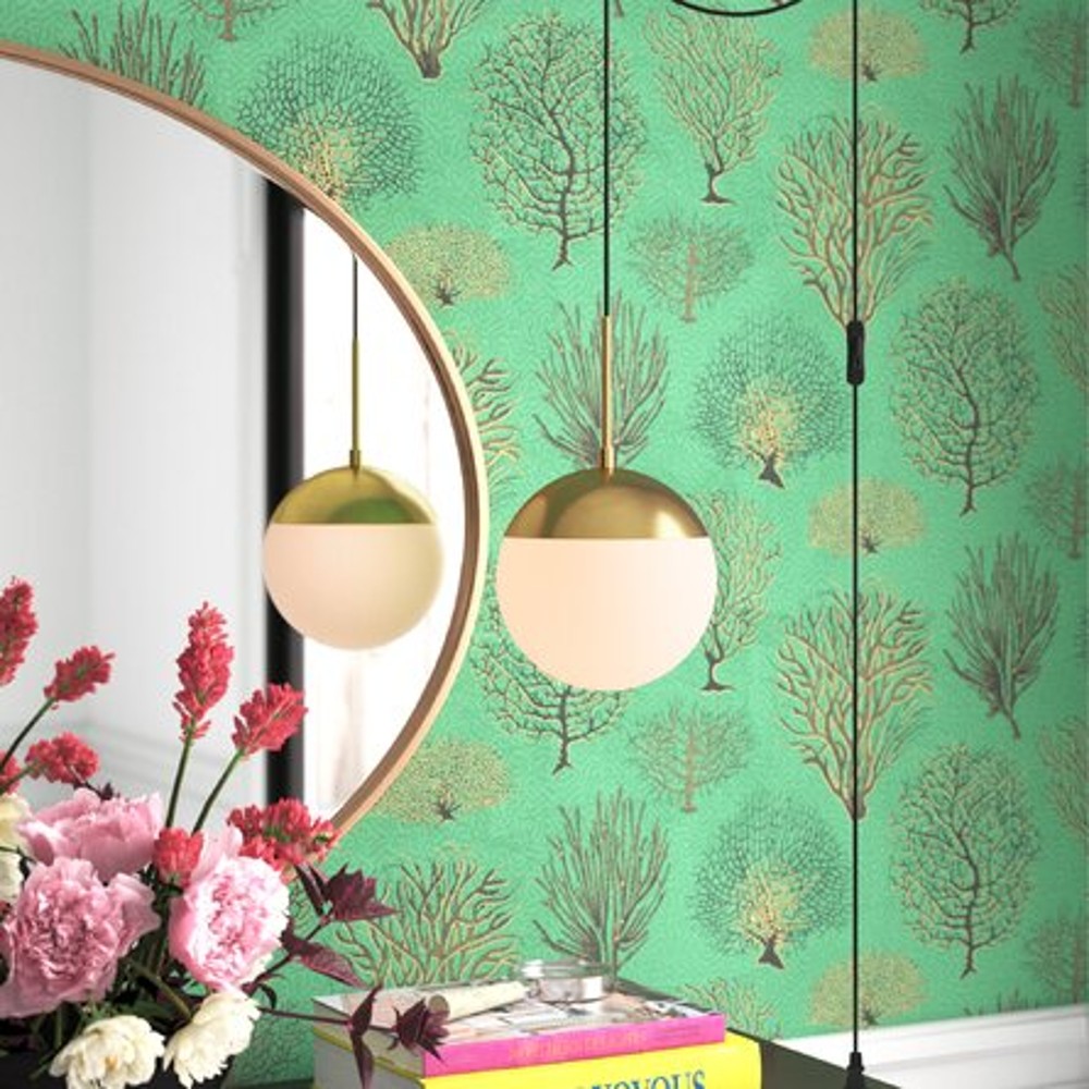 Feeling Amorous with the Armoroso Plug-In Pendant Gold globe plug in pendant against green wallpaper