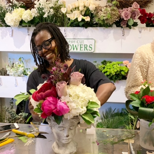 Blooming Flower Bar Blooming Flower Bar's Anji Shukla creating a colourful floral arrangement
