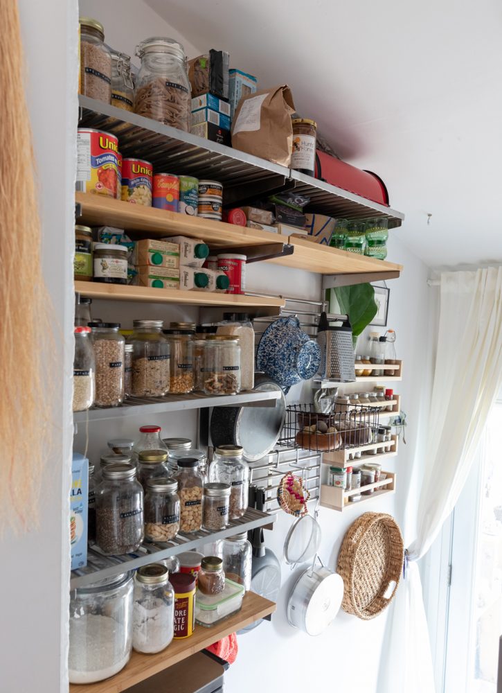 Pantry Goals Walk-in pantry with shelves filled with glass jars