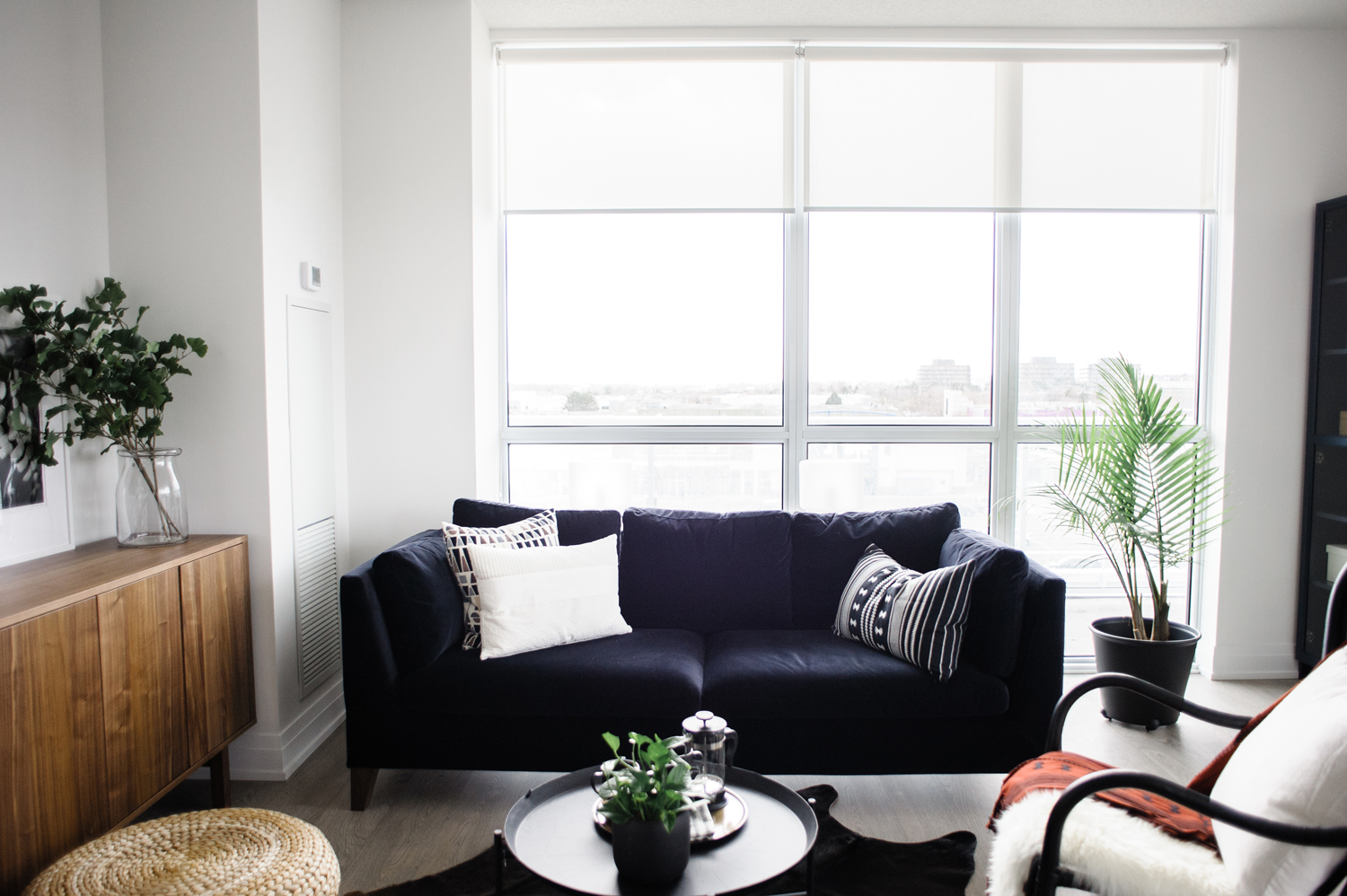 Simplicity is Key Black sofa with decorative pillows