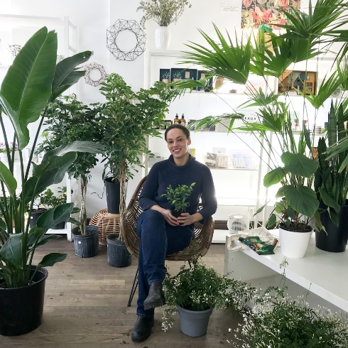 Miss Boon Miss Boon's Sarah Nagué sitting amongst some of her plant creations